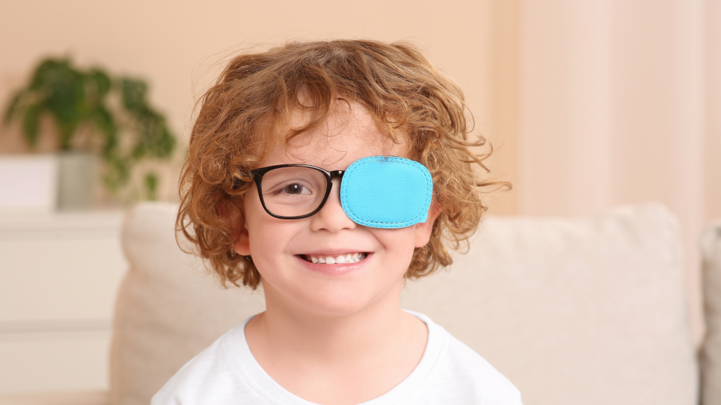 Young patient wearing eye patch during amblyopia treatment evaluation